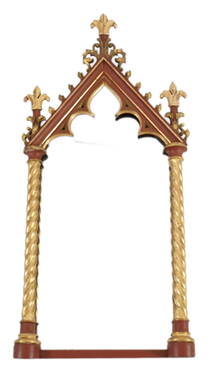 A Victorian Gothic revival painted and giltwood wall mirror